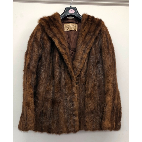 9060 - A brown short mink fur jacket, labelled Theodore Roach, 67cm long, sleeve 62cm long (hole in 1 sleev... 