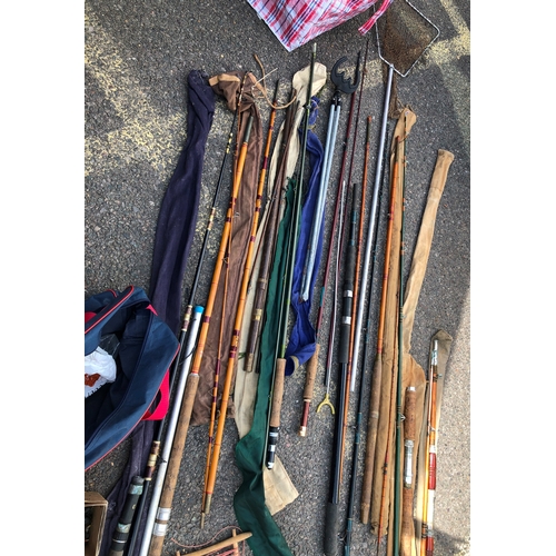 9063 - A large quantity of fishing rods, reels, flies, weights and accessories.