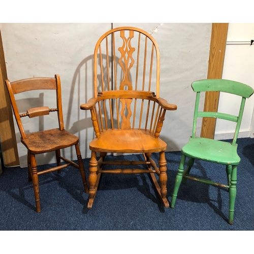 9064 - A pine rocking chair and 2 other chairs.