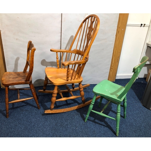 9064 - A pine rocking chair and 2 other chairs.