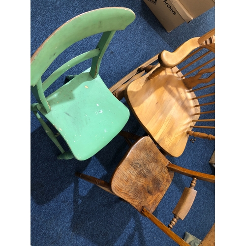 9064 - A pine rocking chair and 2 other chairs.