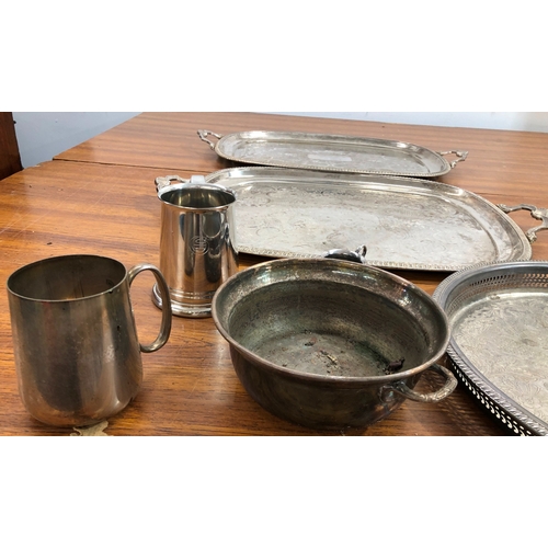 9100 - 2 large silver plated rectangular trays, a circular tray and various silver plated items