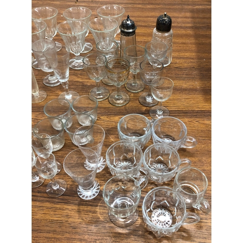 9116 - A large quantity of various drinking glasses etc.