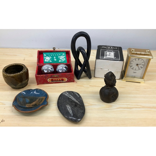 9117 - A modern Legend carriage clock, a pair of Chinese Healthy Balls boxed, a composition figure of a mou... 