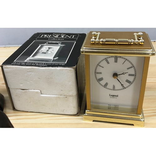 9117 - A modern Legend carriage clock, a pair of Chinese Healthy Balls boxed, a composition figure of a mou... 