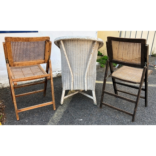 9119 - A pair of folding wooden chairs with cane seats and backs and a Lloyd Loom style tub chair