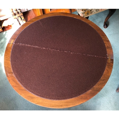 9017 - A burr walnut card table with semi-circular hinged top opening out circular top with brown felt, 4 l... 