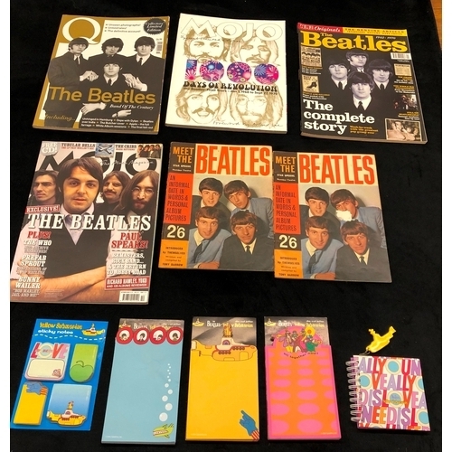 9048 - A quantity of Beatles, magazines and Yellow Submarine note pads etc.