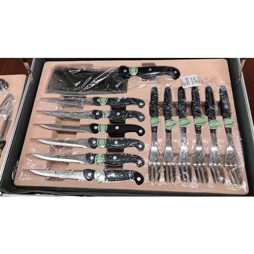 9120 - A Berghaus 24-piece briefcase style knife set (unused)