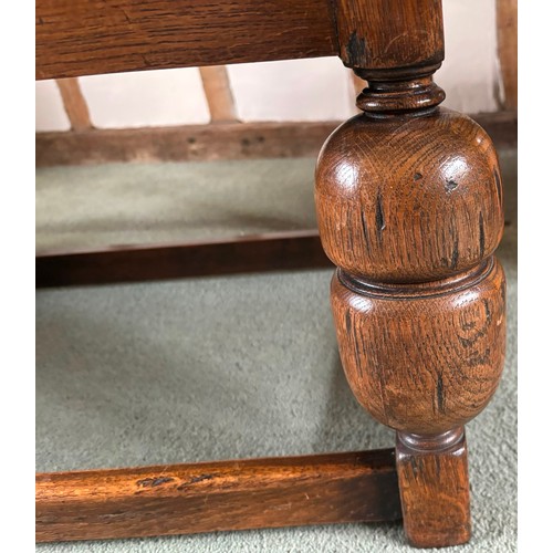 9231 - A1920's oak sideboard with 2 hinged doors with wooden knob handles, sitting either side of 3 central... 