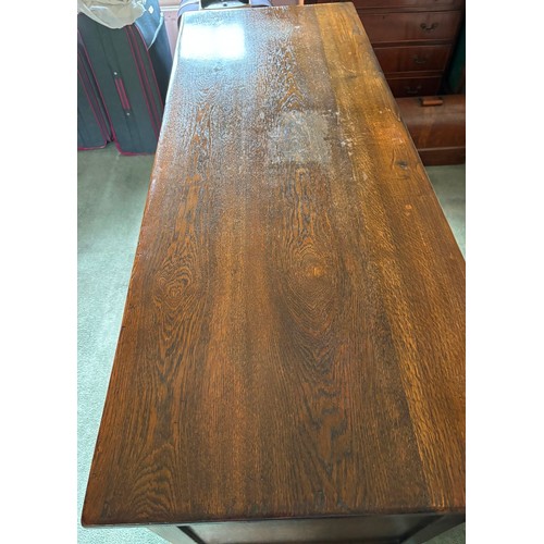 9231 - A1920's oak sideboard with 2 hinged doors with wooden knob handles, sitting either side of 3 central... 