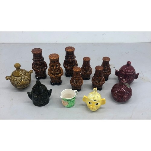 9148 - 3 brown glazed casters in the form of chefs, marked Flour and Sugar, 4 smaller similar salt and pepp... 