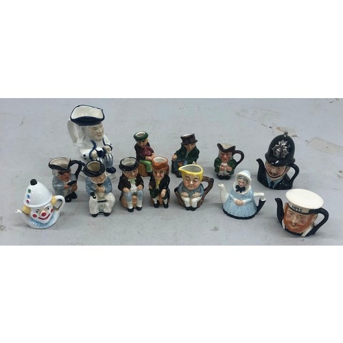 9149 - 4 miniature china teapots, 8 miniature china character jugs and a larger character jug