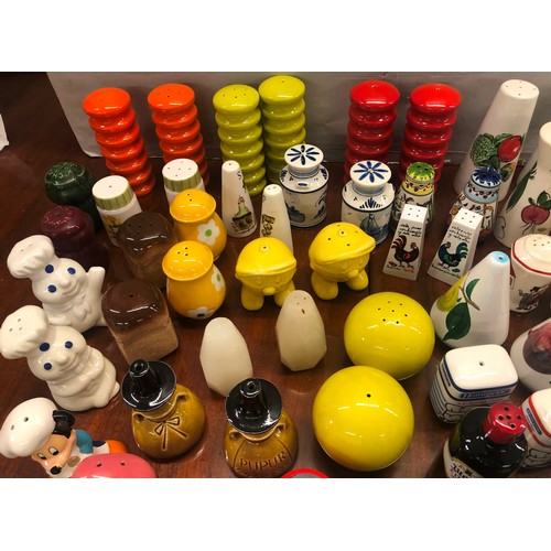 9159 - A collection of novelty condiment salt and pepper pots