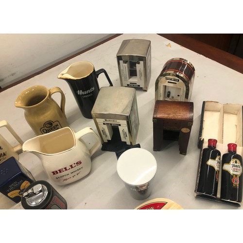 9161 - A quantity of various pub memorabilia jugs, lighters, ashtrays etc.