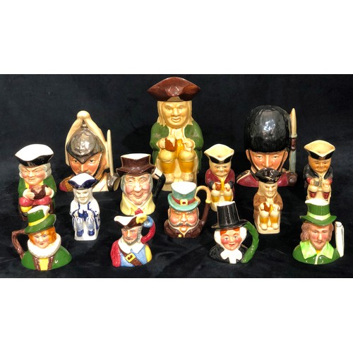 9180 - A Sylvac character jug of a soldier and 13 various small character jugs (14)