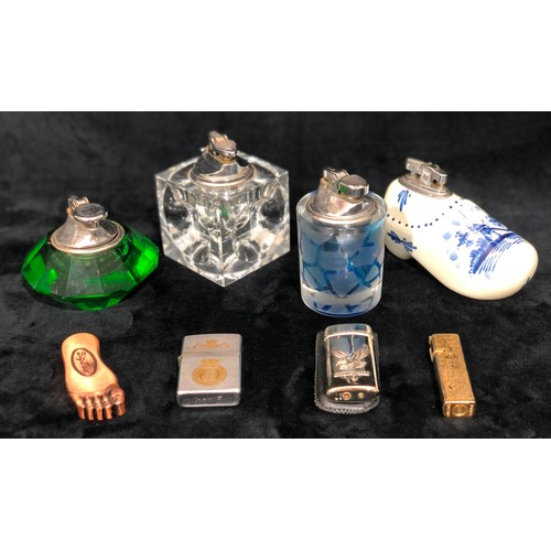 9183 - 4 china and glass table lighters and 4 various other lighters (8)