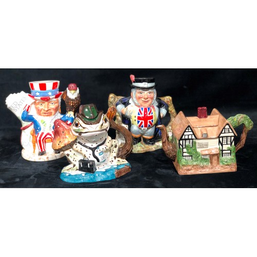 9187 - 4 Staffordshire china novelty teapots, Uncle Sam, 20.5cm high etc. (4)