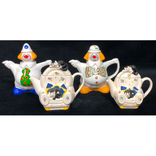 9189 - 4 Wade novelty teapots, Cats sleeping on a chair and 2 clowns, largest 18.5cm high (4)