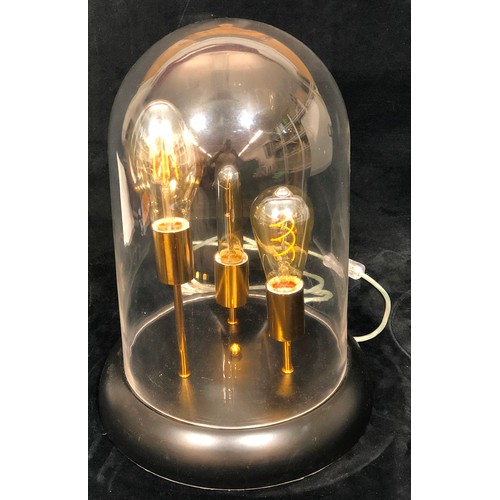 9208 - A modern 3-light table lamp under glass dome, 42cm high (bulbs working)