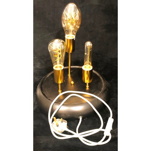 9208 - A modern 3-light table lamp under glass dome, 42cm high (bulbs working)