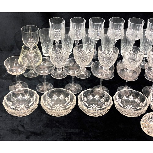 9217 - A set of 6 cut glass trumpet shaped wine glasses, 6 taller wine glasses and a quantity of various od... 