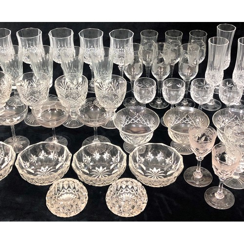 9217 - A set of 6 cut glass trumpet shaped wine glasses, 6 taller wine glasses and a quantity of various od... 