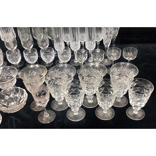 9217 - A set of 6 cut glass trumpet shaped wine glasses, 6 taller wine glasses and a quantity of various od... 