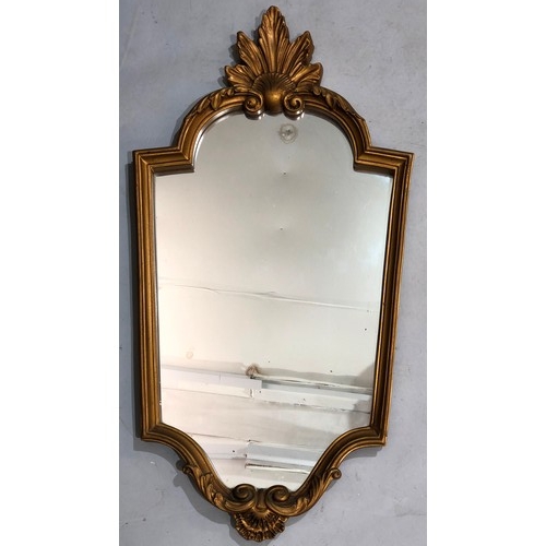 9219 - A gilt plaster hanging wall mirror with raised shell and leaf top, 77cm high, 41cm wide (2nd mirror ... 