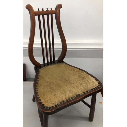 9233 - A mahogany Lyre back nursing chair with studded overstuffed seat, overall height 76cm. This item is ... 