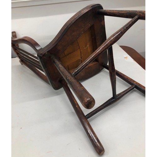 9233 - A mahogany Lyre back nursing chair with studded overstuffed seat, overall height 76cm. This item is ... 