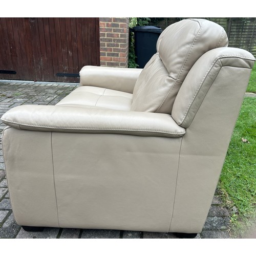 9268 - A good quality modern Italian beige leather 2-seater settee, approx 146cm wide 97cm deep and 90cm hi... 