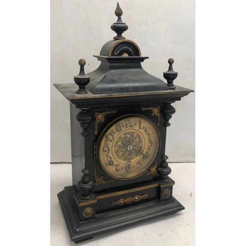 9240 - An ebonised style 8-day striking mantel clock with turned finials, gilt dial with Arabic numerals, 4... 