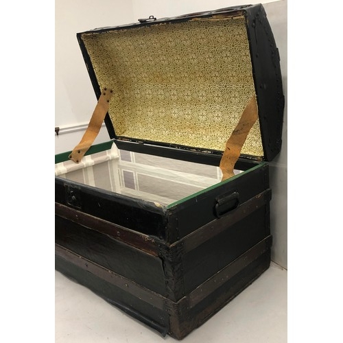 9243 - A dome topped trunk with 2 brass carrying handles, hinged lid (no tray to interior), 84cm wide, 49cm... 