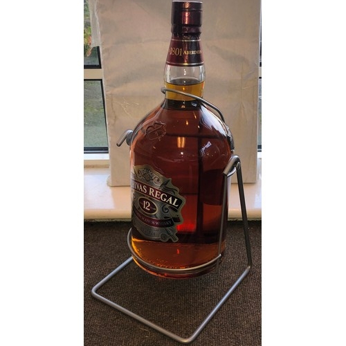 9173 - A Chivas Regal Aged 12 Year Blended Scotch Whisky, 4.5ltr, on metal frame