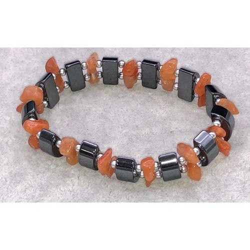 9245 - A gun metal and red agate expanding bracelet