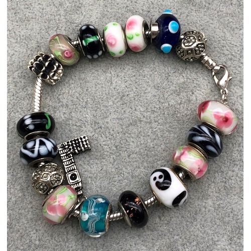 9246 - A Pandora charm bracelet with circular charms