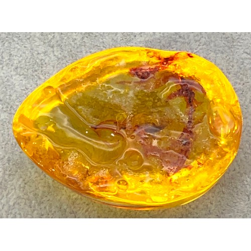 9248 - An amber resin nugget with small scorpion insect, 5.6cm long