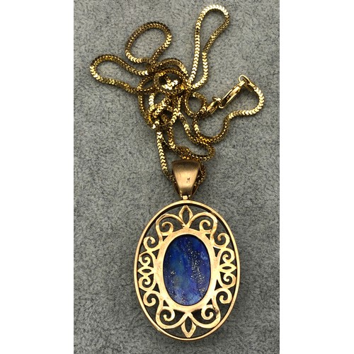 9255 - A silver gilt oval Lapis Lazuli drop pendant with square linked chain, 15.1 grams