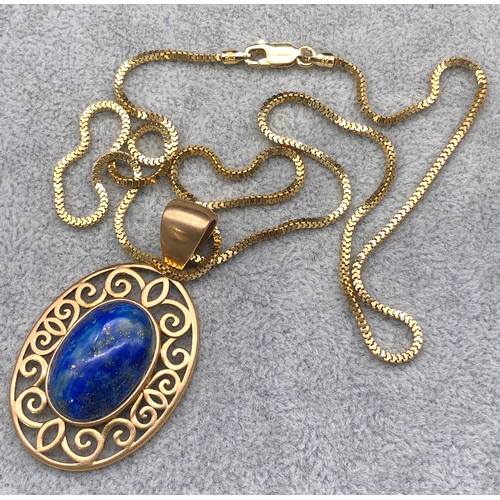 9255 - A silver gilt oval Lapis Lazuli drop pendant with square linked chain, 15.1 grams