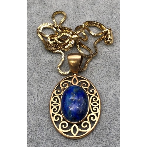 9255 - A silver gilt oval Lapis Lazuli drop pendant with square linked chain, 15.1 grams