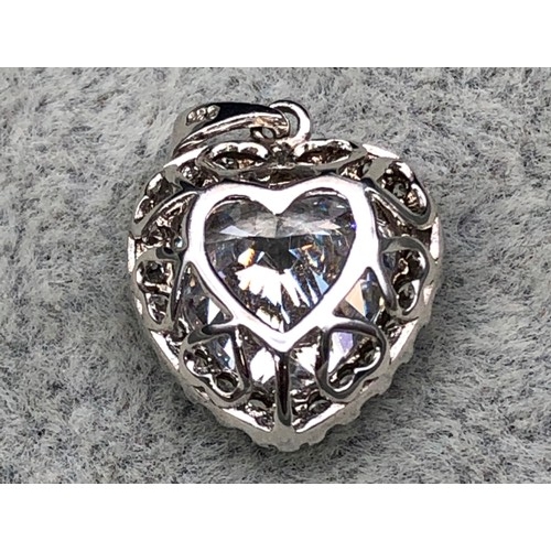 9259 - A silver small cubic zirconia heart shaped pendant, 2cm high, stamped 