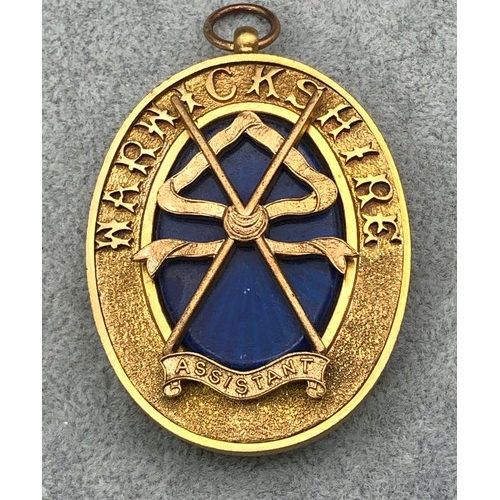 9265 - A Warwickshire gilt metal oval Assistant Medal, 7cm high overall