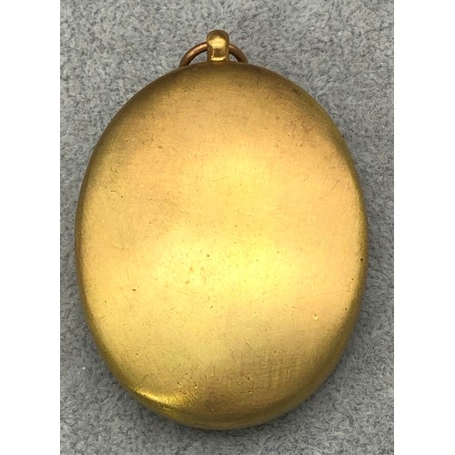 9265 - A Warwickshire gilt metal oval Assistant Medal, 7cm high overall