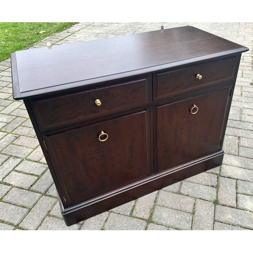 9277 - A Stag Minstrel low cupboard with 2 drawers and 2 panel doors, with label, 72cm high, 96cm wide, 46c... 