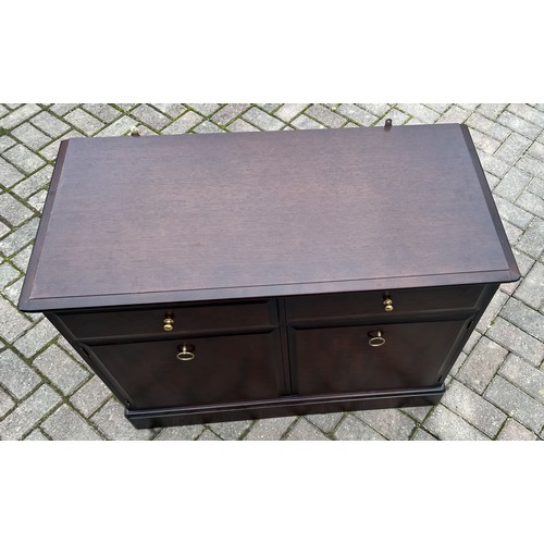 9277 - A Stag Minstrel low cupboard with 2 drawers and 2 panel doors, with label, 72cm high, 96cm wide, 46c... 