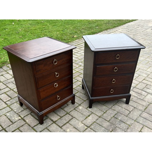 9280 - A pair of Stag Minstrel bedside chests, 72cm high, 53cm wide, 47cm deep. This item is held in storag... 