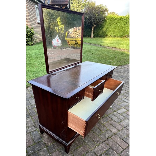 9281 - A Stag Minstrel dressing table with hinged mirror on bracket feet with 4 short drawers, 2 long drawe... 