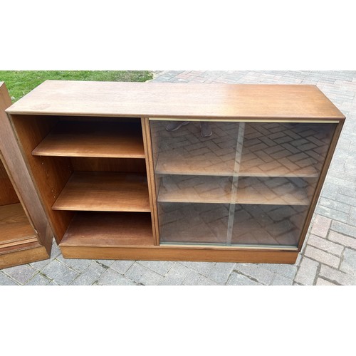 9275 - 2 Minty (Oxford) teak cupboards, 130cm wide, 38cm deep, 88cm high. This item is held in storage, ple... 