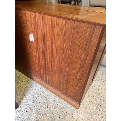 9275 - 2 Minty (Oxford) teak cupboards, 130cm wide, 38cm deep, 88cm high. This item is held in storage, ple... 